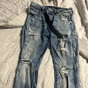 Ripped American eagle blue skinny jeans with stretch material. Size 36